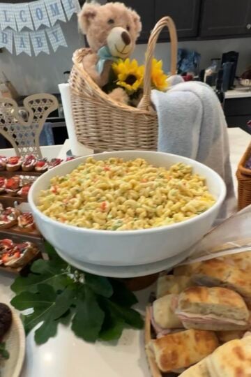 Creamy classic macaroni salad made with elbow macaroni, Duke's mayonnaise, celery, bell pepper, onion, and paprika in a serving bowl, perfect for picnics, potlucks, and summer cookouts.