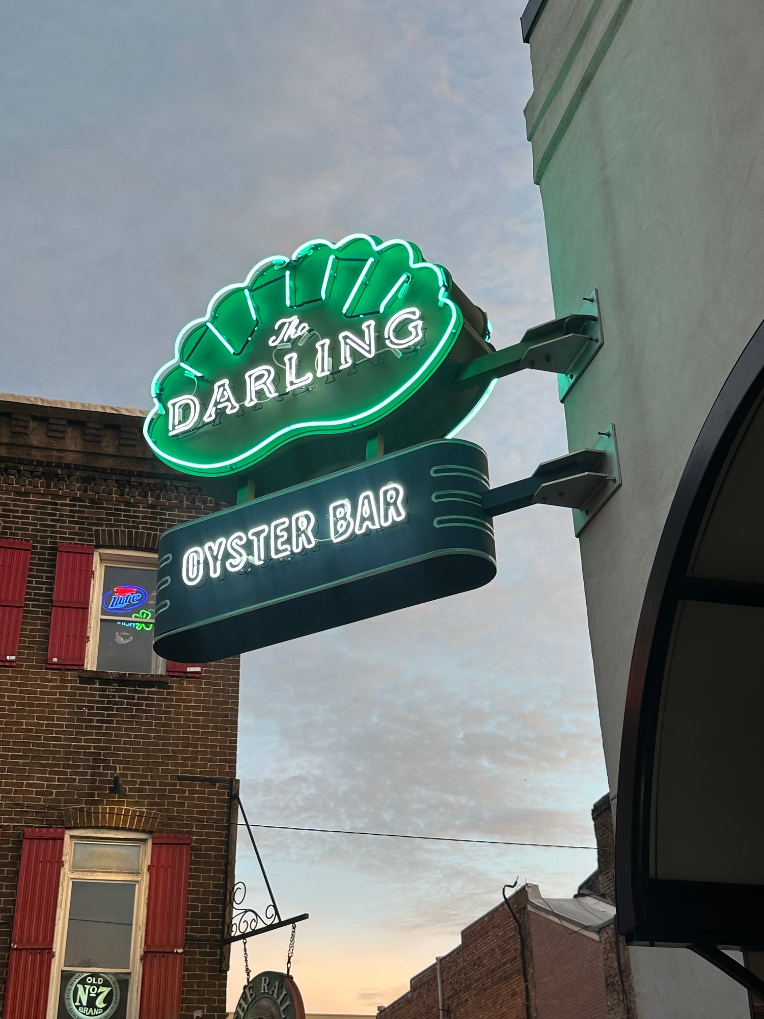 Exterior sign for The Darling Oyster Bar in Savannah, Georgia