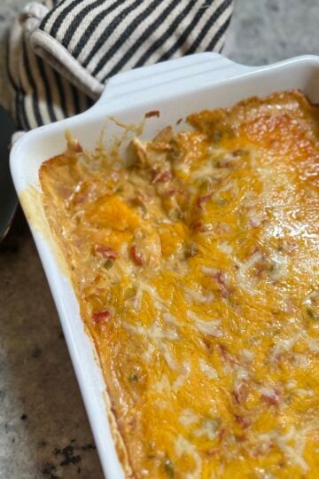 King Ranch Chicken Casserole made with rotisserie chicken, corn tortillas, creamy sauce, and melted cheese, baked until golden and bubbly.