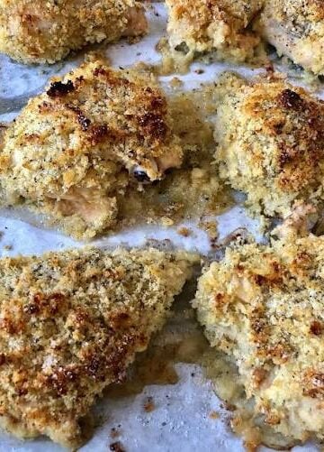 Ina Garten crispy mustard roasted chicken served with creamy zucchini gratin