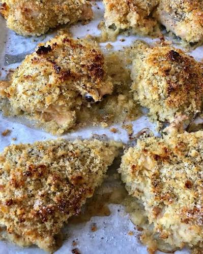 Ina Garten crispy mustard roasted chicken served with creamy zucchini gratin