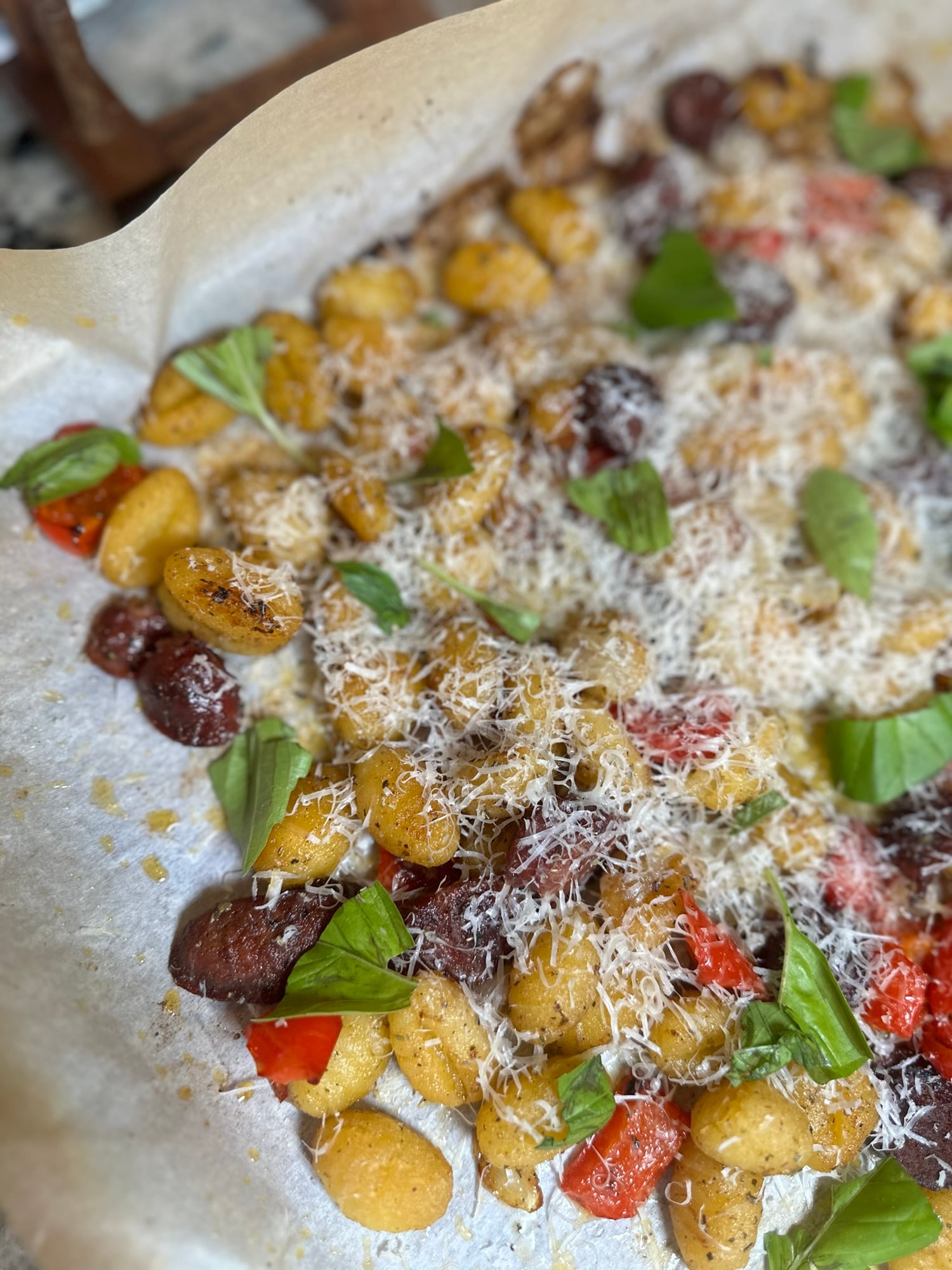Sheet pan smoked Italian sausage with roasted peppers, onions and crispy potato gnocchi.