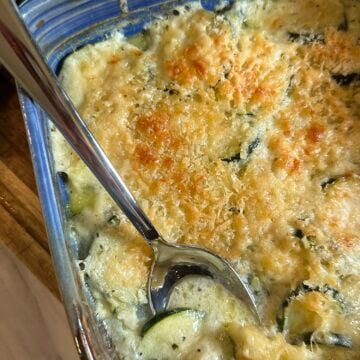 Ina Garten zucchini gratin with tender zucchini, onions, and a golden breadcrumb topping