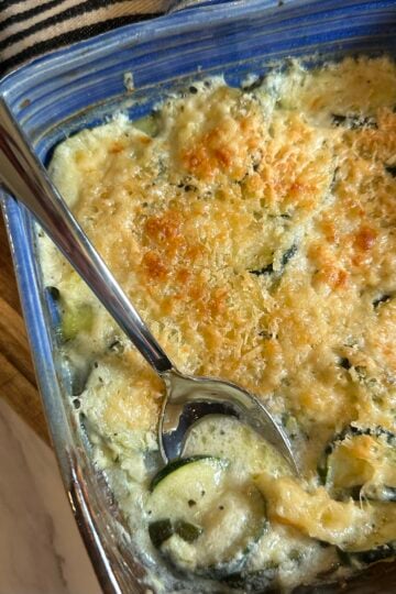 Ina Garten zucchini gratin with tender zucchini, onions, and a golden breadcrumb topping
