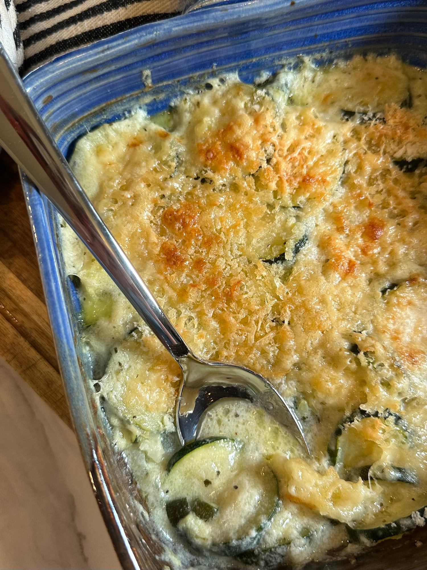 Ina Garten zucchini gratin with tender zucchini, onions, and a golden breadcrumb topping