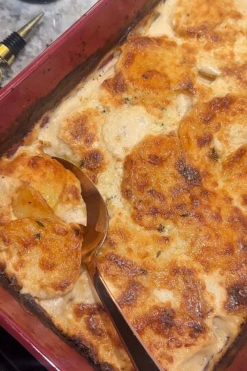 Tyler Florence’s potatoes au gratin with thinly sliced potatoes baked in cream and Parmesan cheese