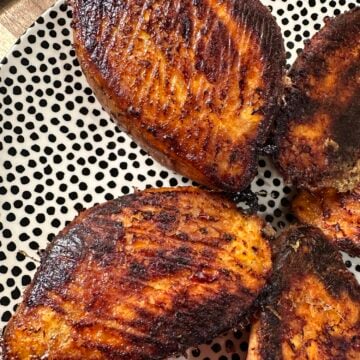 Baked sweet potato halves with a golden butter and Parmesan crust.